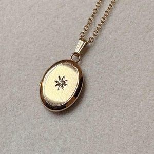 14kt Gold Oval Locket with Diamond Charm