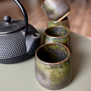 Handmade stoneware coffee cup, minimalist ceramics tea mug. Pinched Waist Cup.