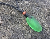 UNISEX-RARE Kiwi Green, Surf Tumbled Seaglass, Wooden Bead, Hawaiian Puka Shell, Black Artificial Sinew Cord Necklace