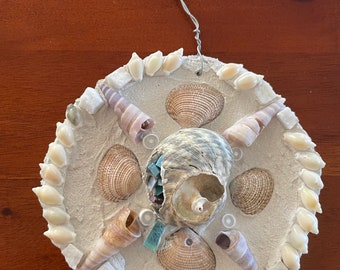 Mosaic artwork - Shell Mandala - hint of mauve, with a unique handmade wire hanger.  Beachside decor for the home or holiday home