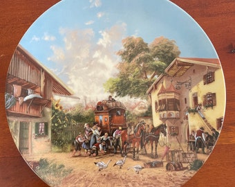 Collectible Plate- Germany porcelain maker. Charming design of village life by Christian Luckel, titled  "Arrival of the Stagecoach".