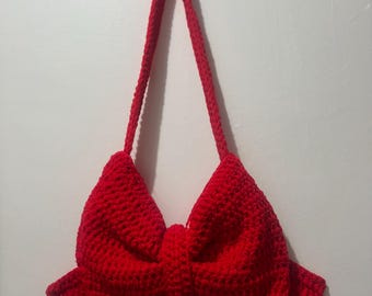 Borsa a tracolla con fiocco all'uncinetto