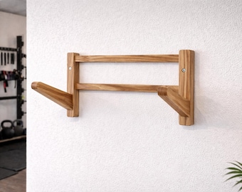 Wall mount for yoga mats made of solid ash wood, home gym