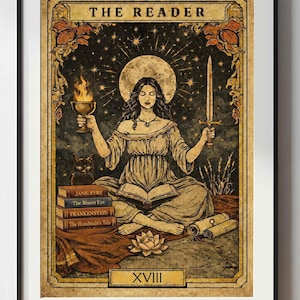 May include: Tarot card print featuring "The Reader" with a woman holding a chalice and sword, seated before a full moon. Includes the text "THE READER" and the Roman numeral "XVIII". Books and a black cat are also depicted.