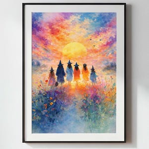 May include: A framed watercolour print depicting seven figures in witch hats walking towards a large yellow sun. The figures are in a field of colourful flowers, with an orange, pink, and blue sky. The artwork is framed in a black border.