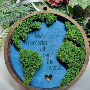 Machen Sie Erinnerungen auf der ganzen Welt, Rentiermoos, Globus, Reiseornament, Nomadenornament