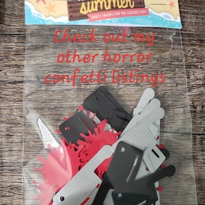 May include: A clear plastic bag filled with red, black, and silver confetti shaped like knives and blood splatters. The bag has a label that says "a little bit of summer" and "party favors for the coolest kids". The text "Check out my other horror confetti listings" is written in red on the bag.