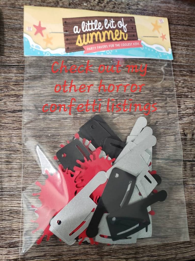 May include: A clear plastic bag filled with red, black, and silver confetti shaped like knives and blood splatters. The bag has a label that says "a little bit of summer" and "party favors for the coolest kids". The text "Check out my other horror confetti listings" is written in red on the bag.