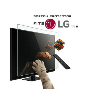 May include: A screen protector for LG TVs is displayed in front of a black television. The words "SCREEN PROTECTOR FITS LG TVS" are printed above the TV. A Rubik's cube, a wooden car, and a remote control are also in the image.