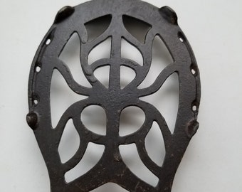 Horseshoe shaped sad iron trivet / spider trivet / iron rest / Cast iron trivet