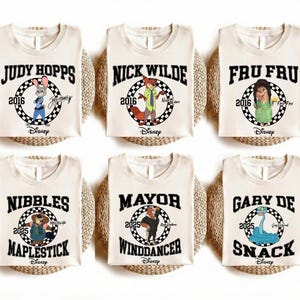 May include: Six off-white sleeveless shirts featuring Disney character graphics. Each shirt displays a name, a year, a checkered circle, and the Disney logo. Characters include Judy Hopps, Nick Wilde, Fru Fru, Nibbles Maplestick, Mayor Winddancer, and Gary De Snack.