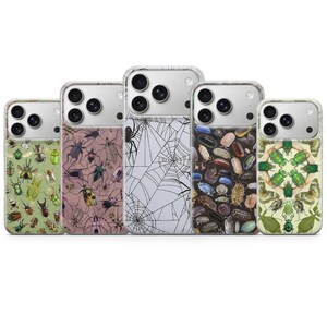 May include: Five phone cases with insect and spider web designs. The cases feature various insects in green, pink, and brown, and a white spider web design. The cases are made of clear plastic and have a glossy finish.