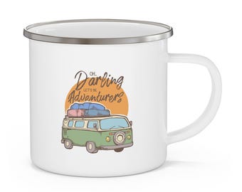 May include: White enamel mug with a silver rim and handle. The mug features a graphic of a green and beige camper van with luggage on top, set against an orange sun. Text reads "Oh Darling, Let's Be Adventurers."