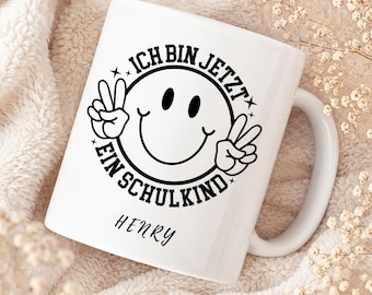 Personalisierte Einschulung Tasse mit Name – Ich bin jetzt ein Schulkind – Geschenk zur Einschulung – Schulanfang – Kaffeebecher Kind Smile