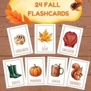 Puede incluir: Un conjunto de 24 tarjetas didácticas de otoño con ilustraciones en acuarela de elementos estacionales como un rollo de canela, una hoja, un suéter rojo, botas verdes, una calabaza, una taza de cacao y una ardilla, etiquetadas con texto.