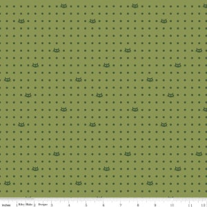 Op de afbeelding: Groene stof met een herhalend patroon van kleine zwarte stippen en zwarte kattengezichten. De stof is 12 inch breed.