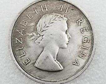 Moneda de dólar de plata inglés de 1958