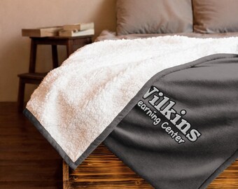 Logotipo de WLC - Manta de forro polar Sherpa bordada