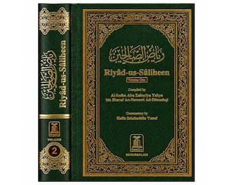 May include: A dark green hardcover book titled Riyad-us-Saliheen Volume One, featuring gold embossed Arabic calligraphy and English text. The spine shows Volume 2 with matching gold decorative patterns and Arabic script on a dark green background.