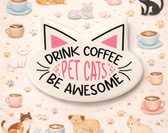 May include: A whimsical illustration featuring a cat-shaped design with the text "DRINK COFFEE PET CATS BE AWESOME." The image includes various cat illustrations, coffee cups, and paw prints in soft pastel colors.