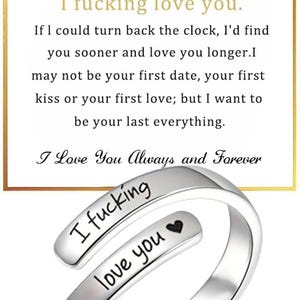 May include: A silver ring with the words "I fucking love you" engraved on it. The ring has a heart symbol and is set against a white background with a gold border. The text "I Love You Always and Forever" is also visible.