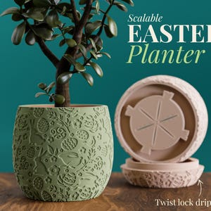 May include: A green Easter planter with a detailed embossed design of Easter eggs and bunnies. The planter includes a twist-lock drip tray. The image also shows a small tree planted in the planter. Text on the image reads "Scalable Easter Planter".