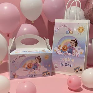 May include: A set of three ceramic mugs with a speckled, matte finish. Each mug features a different color: light blue, cream, and gray. The mugs have a simple, modern design and a comfortable handle. Perfect for coffee or tea.