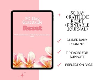 May include: A digital tablet displays a pink cover with the text "30 Day Gratitude Reset." The cover features floral artwork and the text "A Reflection Workbook to Rebuild Hope, Presence & Inner Peace." Additional text includes "30-DAY GRATITUDE RESET (PRINTABLE JOURNAL)."