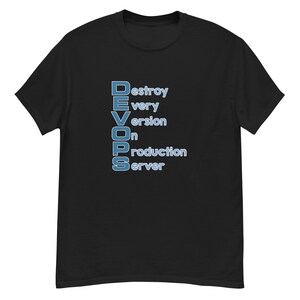 May include: Black t-shirt featuring the word "DEVOPS" in blue, arranged vertically. Each letter is followed by a word: Destroy, Every, Version, On, Production, Server. The text is in a sans-serif font.