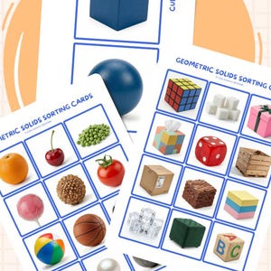 May include: Educational sorting cards featuring geometric solids and everyday objects. The cards include a blue cube, a blue sphere, a Rubik's cube, a dice, a gift box, and various food items. The text "Geometric Solids Shapes" and "Cube" are visible.
