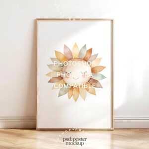May include: A framed poster mockup featuring a watercolor illustration of a smiling sunflower with closed eyes. The sunflower has petals in shades of yellow, brown, and green. The text "PHOTOSHOP COMPATIBLE" is visible on the poster.