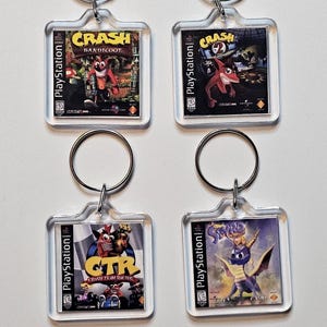 PS1 Game Keychain – Crash Bandicoot, Spyro, CTR, Rayman (Double Sided)