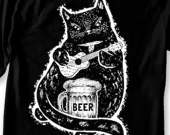 May include: Black and white illustration of a cat playing a ukulele and holding a glass of beer that says "BEER" on it.