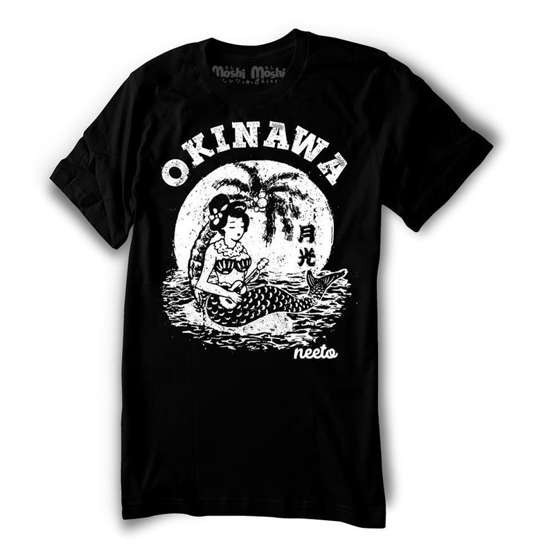 May include: Black t-shirt with a white graphic featuring the word "OKINAWA" above a mermaid playing a ukulele in front of a full moon and palm tree. The Japanese characters for "moonlight" are also included. The word "neeto" is at the bottom.