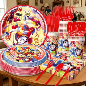 May include: A colorful party supplies set featuring plates, cups, cutlery, and napkins. The plates and cups have a cartoon character design with red, yellow, blue, and purple accents. Red forks, spoons, and knives are included.