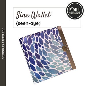 May include: A blue and white patterned wallet with a gold clasp. The wallet has a leaf design and the text "Sine Wallet (seen-aye)" is printed on the top.