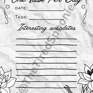 May include: A black and white journal page with the text "One Task Per Day," "Date," "Task," and "Interesting anecdotes." The page has a floral design at the bottom and decorative swirls at the top. The background is a textured, crumpled paper.