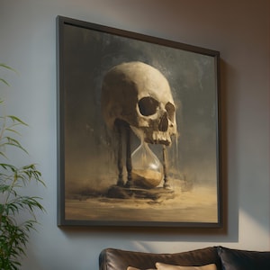 May include: A framed canvas art print depicting a skull above an hourglass. The skull is off-white with dark shadows, and the hourglass contains sand. The background is a muted, dark gray, and the frame is black.
