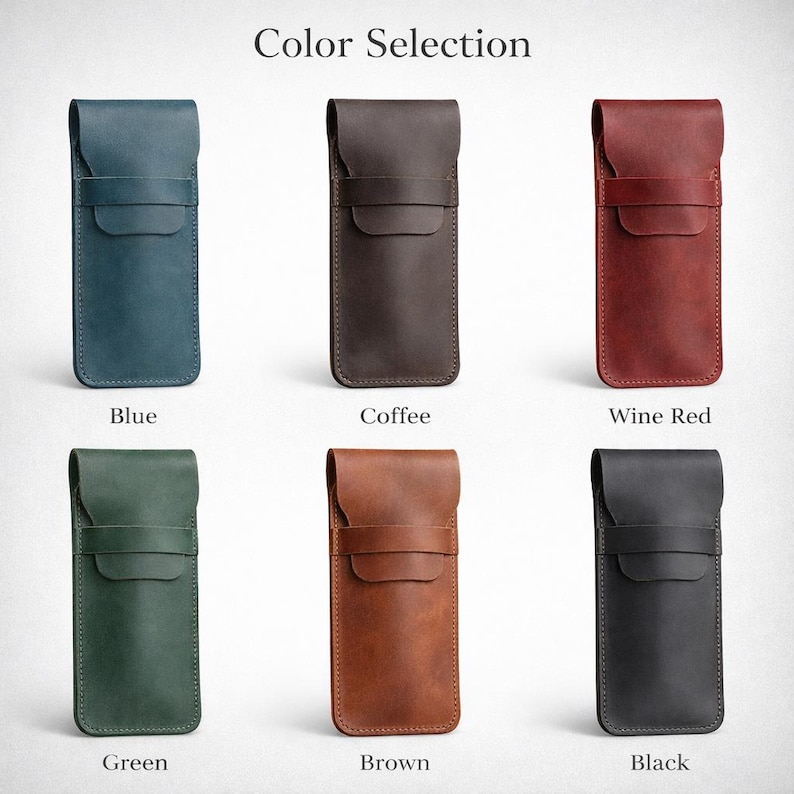 May include: A selection of leather pen cases in various colors, including blue, coffee, wine red, green, brown, and black. Each case features a flap closure and is displayed against a neutral background. The text "Color Selection" is at the top.