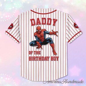 May include: White baseball jersey with red pinstripes, featuring a Spider-Man graphic and the text "DADDY OF THE BIRTHDAY BOY." The jersey has red accents and Spider-Man logos on the sleeves.