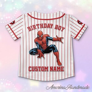 May include: White and red striped baseball jersey featuring a Spider-Man graphic. The jersey has the text "BIRTHDAY BOY" and "CUSTOM NAME" in red. The sleeves have a Spider-Man logo.