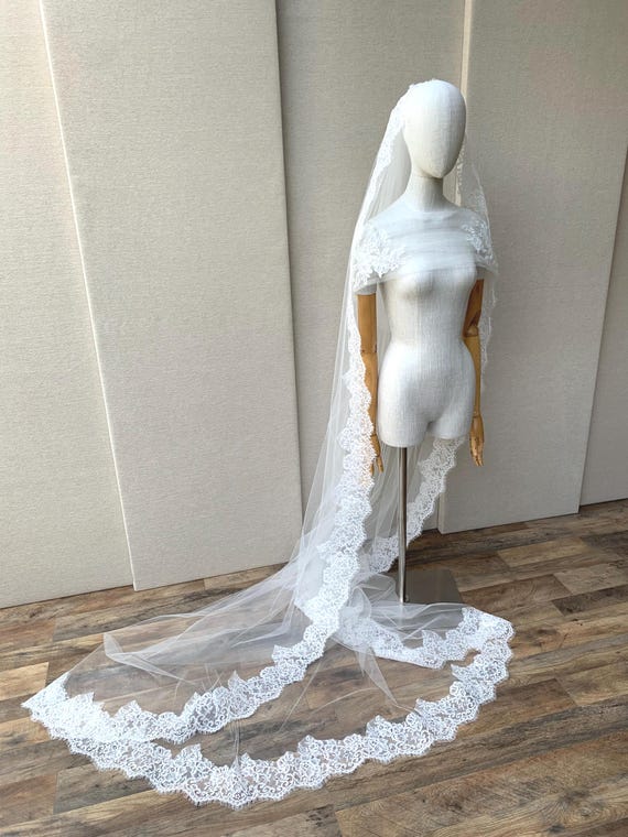 Alencon lace Cathedral veil and a matching shoulder wrap