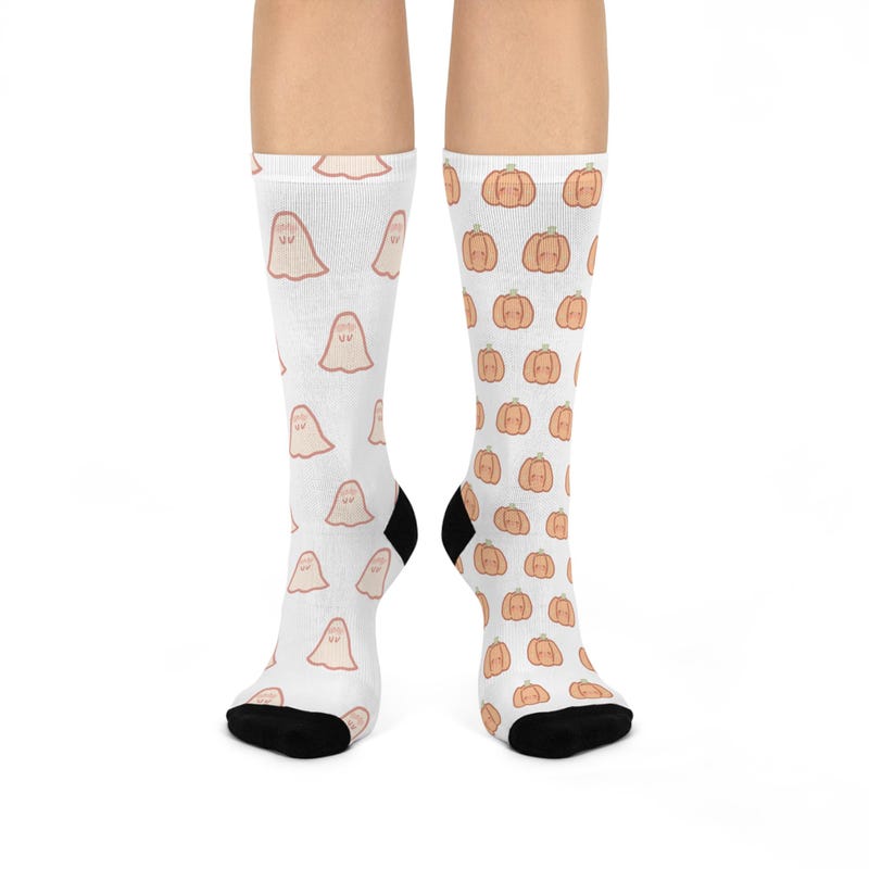 Socks decorated with little ghosts and pumpkins