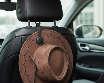 トラック用カスタマイズされたウエスタンカウボーイハットホルダー、車用帽子ホルダー、車用カウボーイハットラック、レザーマグネットキャップクリップ、トラック用カーシートハットオーガナイザー