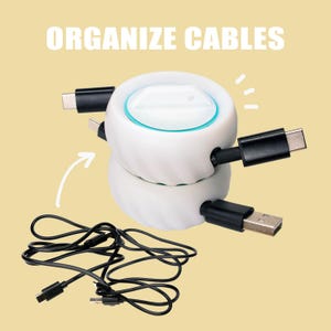 May include: White cable organizer with a teal accent, holding various black cables with USB and USB-C connectors. The text "ORGANIZE CABLES" is displayed in white block letters on a yellow background.