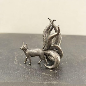 Nine-tailed Fox Bronze Sculpture - A handcrafted silver-toned art piece, a mythical animal statue