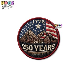 May include: A round patch with a patriotic design. The patch features a mountain range, the American flag, and the text "1776", "2026", and "250 YEARS". The border is red.