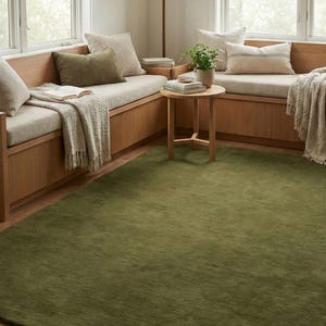 Minimalist solid olive green rug, soft wool carpet for contemporary and earthy home decor