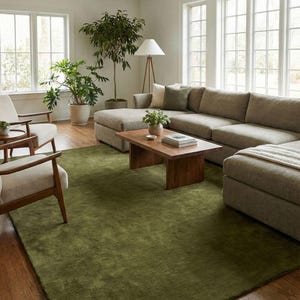 Solid olive green area rug with soft wool texture, minimalist modern carpet for living room and bedroom decor