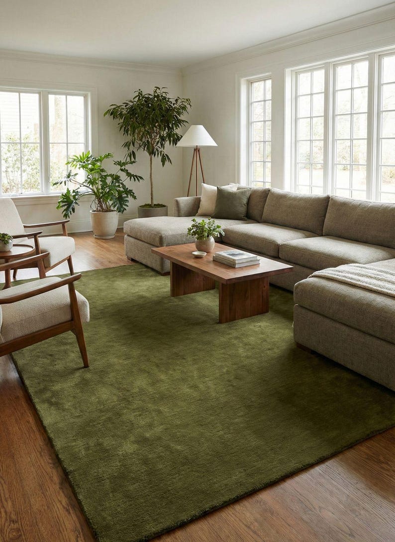 Solid olive green area rug with soft wool texture, minimalist modern carpet for living room and bedroom decor